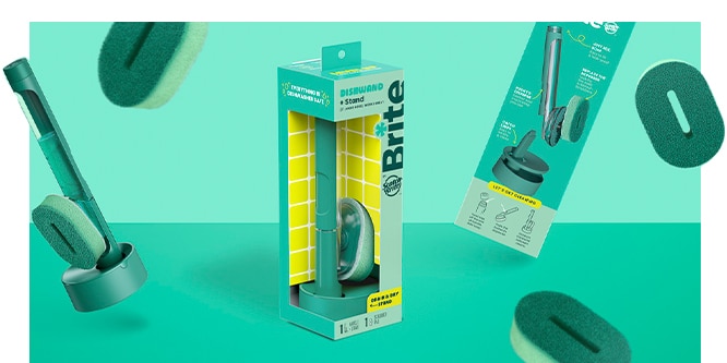 Packaging and components of a dish wand cleaning set against a turquoise background with floating sponge elements.

