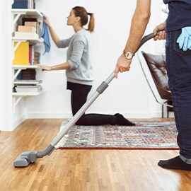 two people cleaning together