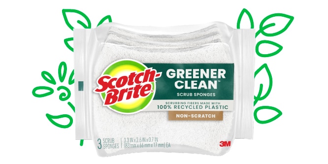 Scotch-Brite® Greener Clean™ Non-Scratch Scrub Sponge in package with leaf illustrations behind it.
